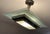 This rectangular Art Deco chandelier from Petitot is made of nickel-plated brass and features a partially etched glass...