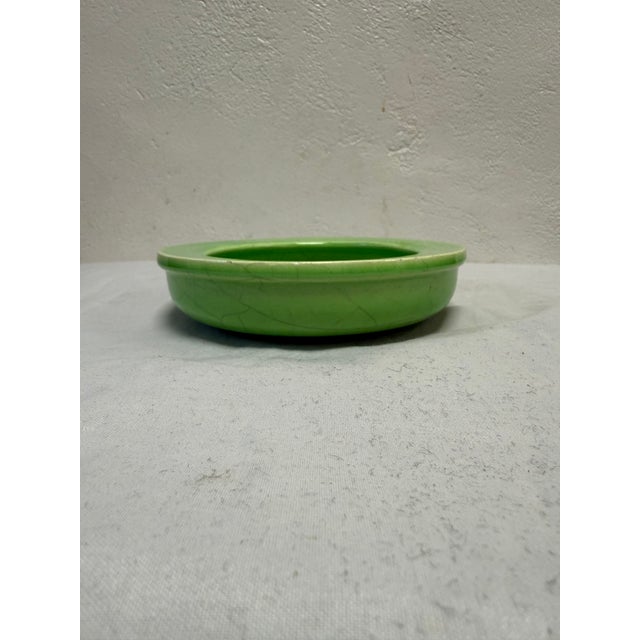 Wide rim celadon crackle glaze low bowl planter. The bowl is not marked.