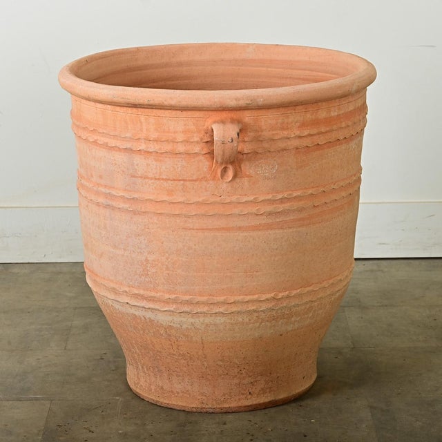 Dimensions: 25 ⅜” H x 25” W x 23 ½” D Greek reproduction terracotta pot, or planter, made on the island of Crete using...