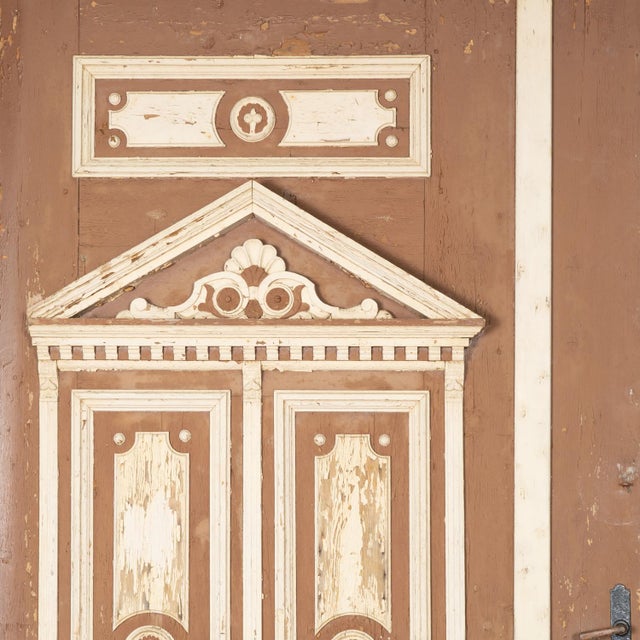 Extremely large rustic doors from Hungary, over 12' wide and 11' tall. The original brown and white painted finish shows...