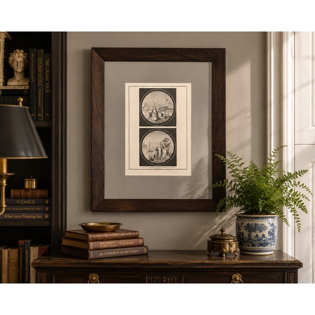 A beautifully presented 18th-century Italian copperplate engraving depicting two finely rendered classical architectural...