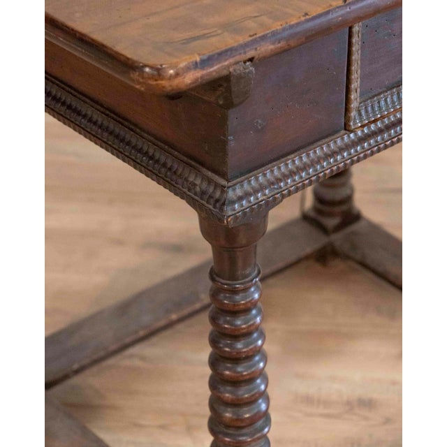 A handsome French changer’s table originating from the Jura region, crafted in the 18th century. The table features a...