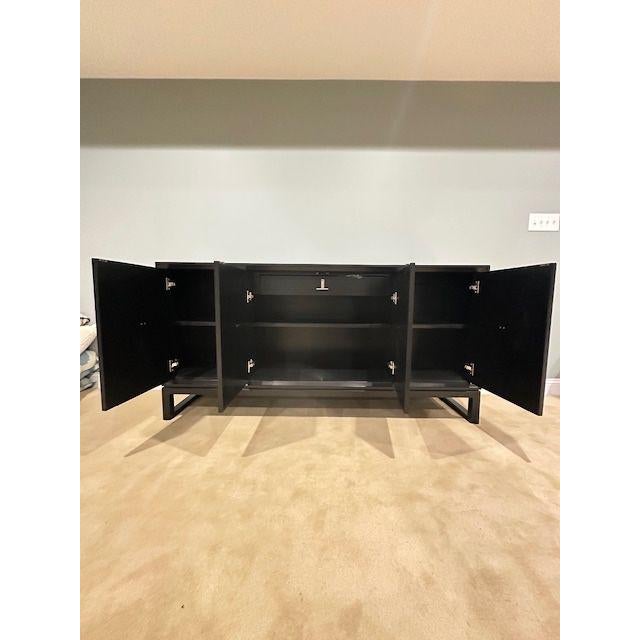 Vanguard Furniture Console Sleek Vanguard Furniture console with a modern profile. Finished in a deep charcoal tone, it...