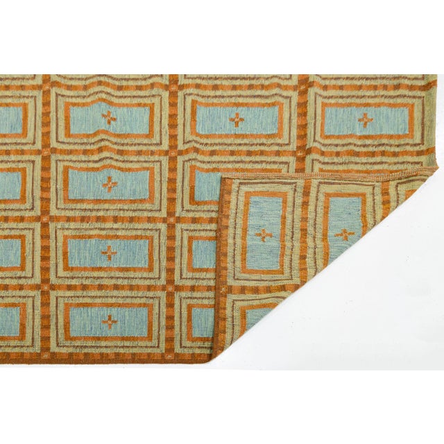 This stunning flatweave rug captures the minimalist elegance of mid-century Scandinavian design. Hand-woven with premium...