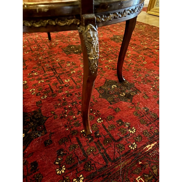 A highly distinctive antique Victorian mahogany tête-à-tête, beautifully executed with refined decorative elements and...