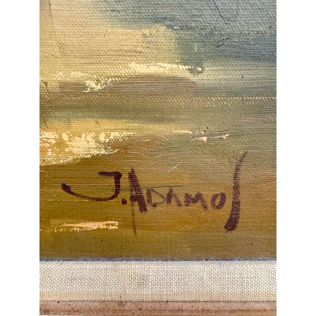 A charming mid-century oil on canvas signed J. Adamos, beautifully presented in a gold-toned wood frame. This warm...