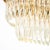 The chandelier originates from Italy circa 1970. Features an oblong geometric frame composed in polished brass, with...