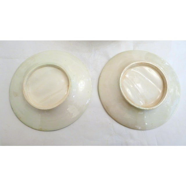 Beautiful set of 8 antique asparagus plates in slipware. Round shape, decorated in relief with 4 asparagus spears,...