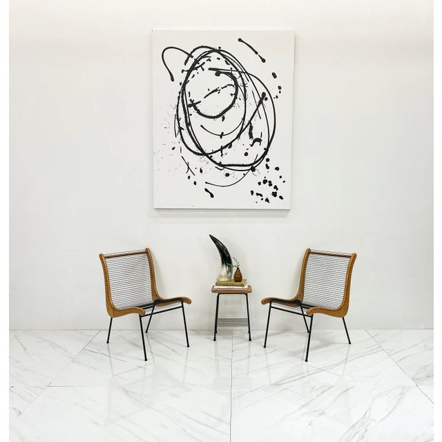 These lounge chairs are gorgeous and provocative. These lounge chairs designed by the acclaimed architect Carl Koch for...