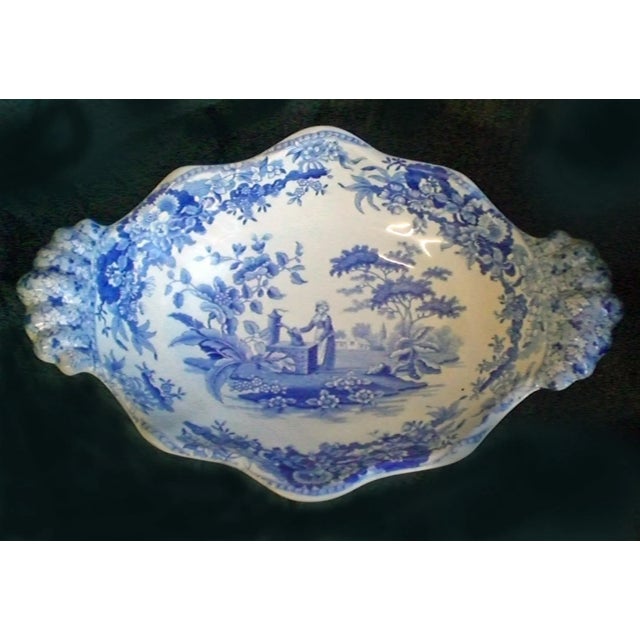 Spode blue and white pearlware footed dessert compote in the Girl At Well pattern with scalloped rim and scalloped shell-...