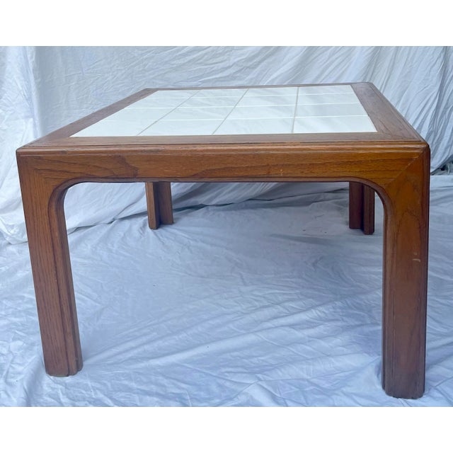 The only thing that's square about this table is its shape! Clean lines and crisp neutral colors give this square coffee/...