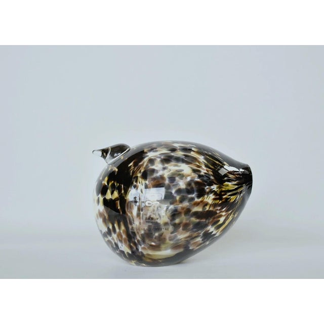 This is a Marked Bengt Edenfalk Skruf Bird Hand Blown Piece. It is in a leopard pattern. Lead Glass it has a bit of weight...