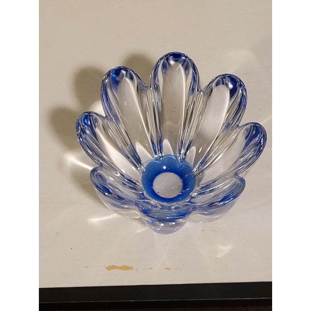 This is a beautiful art glass piece that catches the light wonderfully. It goes with any decor and looks dainty but it...