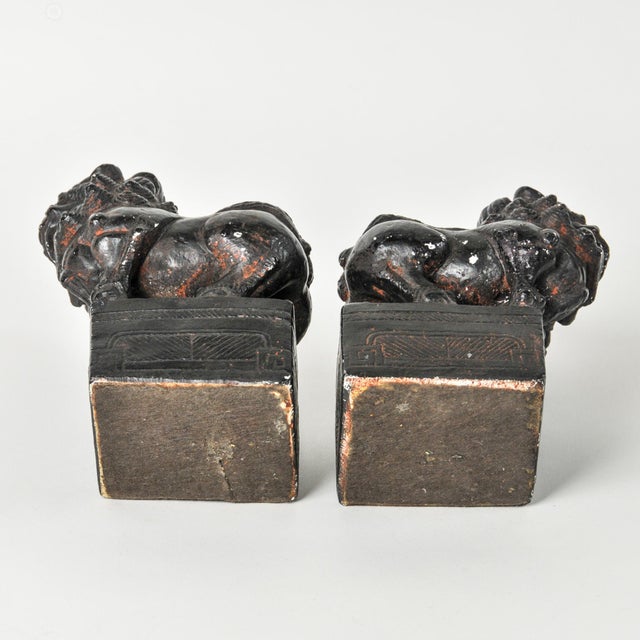 Black Mid 20th Century Rare Pair of Asian Art Foo Dog Guardian Lion Bookends With Figures For Sale - Image 8 of 16