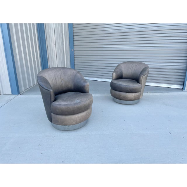 Beautiful pair of vintage leather chrome swivel chairs designed by Sally Sirkin Lewis for J Robert Scott & Associates in...