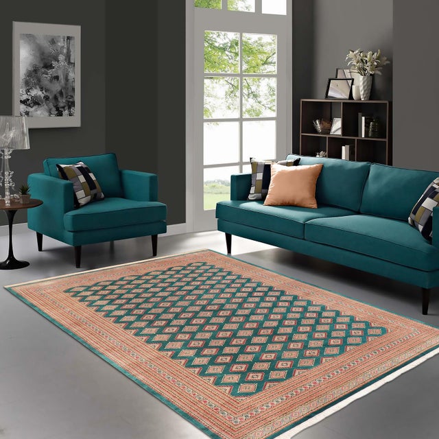 Transform the interior of your home with a beautiful hand-knotted Bokhara rug. Meticulously crafted with intricate...