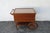 This classic Tea Cart is made of wood, solid wood, mahogany, veneer, and glass. The Cart has a traditional style and...