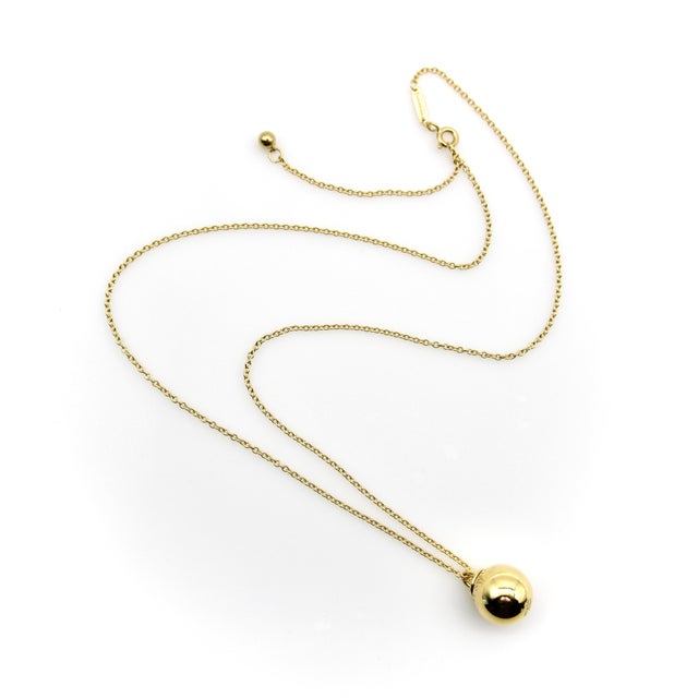 This iconic 18k gold ball pendant necklace is from the Tiffany & Co. HardWear series. As the name implies, the HardWear...