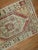One of a kind, mid 20th-century Hand-knotted Turkish runner with a tribal medallion and border design. Professionally...