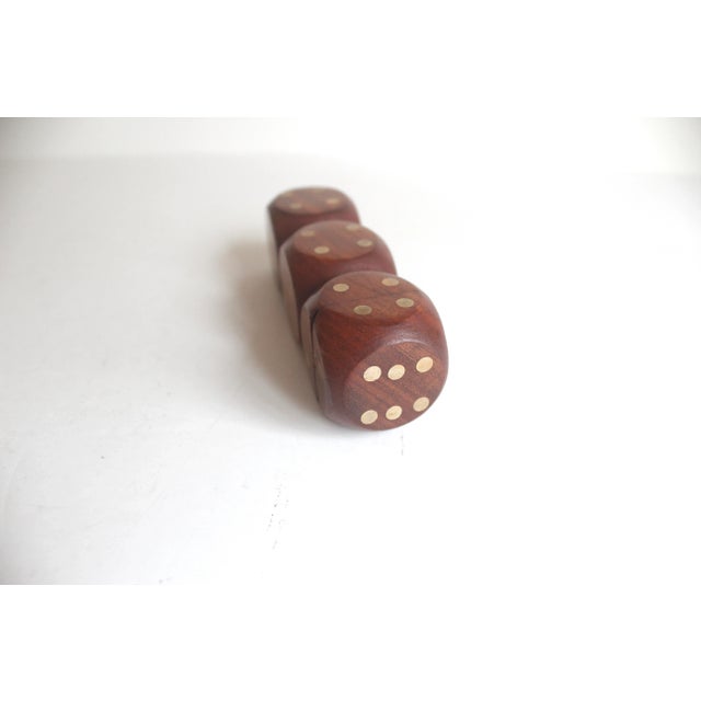 Wow! These are so cool. Large wood with inlaid brass dice holder box with a set of five wood and brass dice inside. The...
