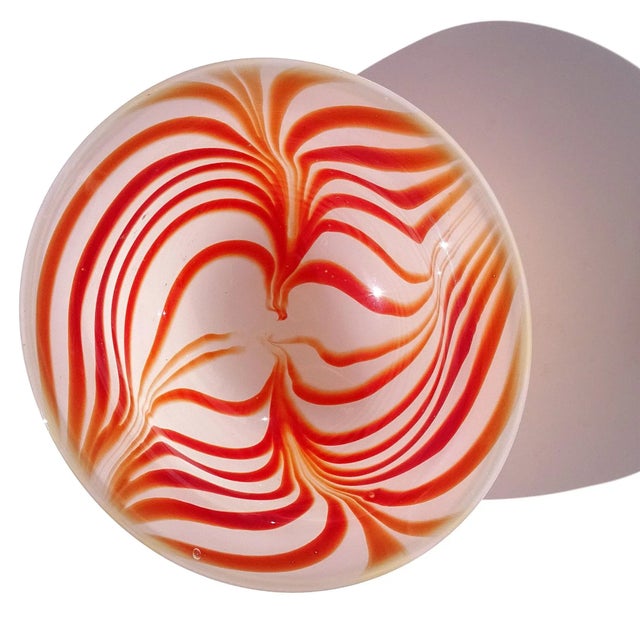 Beautiful vintage Murano hand blown red orange optic design over opalescent Italian art glass geode bowl. Very unique...