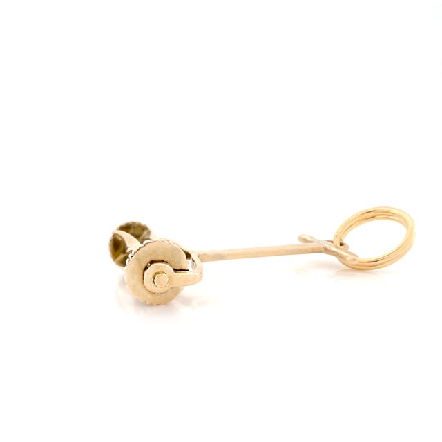 About This Charm: A playful little reminder of days spent outdoors, this vintage yellow gold lawn mower charm is full of...