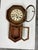 Design Plus Gallery presents an Antique Meiji Clock Co. Octagonal Pendulum Wall Clock. The wood case has an octagonal...
