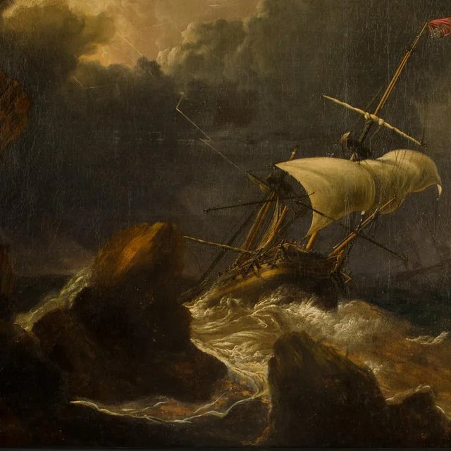 The unsigned oil on canvas depicting ships in a turbulent storm. Framed dimensions: 54 in x 37 in