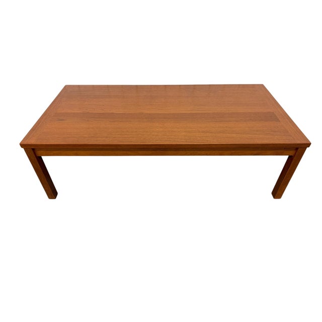 Elevate your living space with this beautifully refinished Danish Modern teak coffee table. Showcasing the clean lines and...