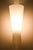 This elegant pair of mid-century modern wall lamps, produced in sweden by an unknown designer, reflects the understated...