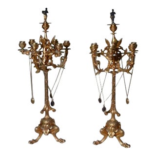 Palatial French Gilt Bronze Candelabra with Musician Snuffers, circa 1830 - a Pair For Sale