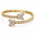 Structured and richly detailed, this 10K Yellow Gold designer bangle is set with round and baguette-cut natural diamonds...