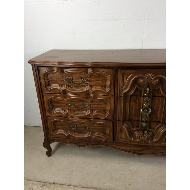 French Provincial Mid Century French Provincial Style Lowboy Dresser With Ornate Drawer Faces For Sale - Image 3 of 18