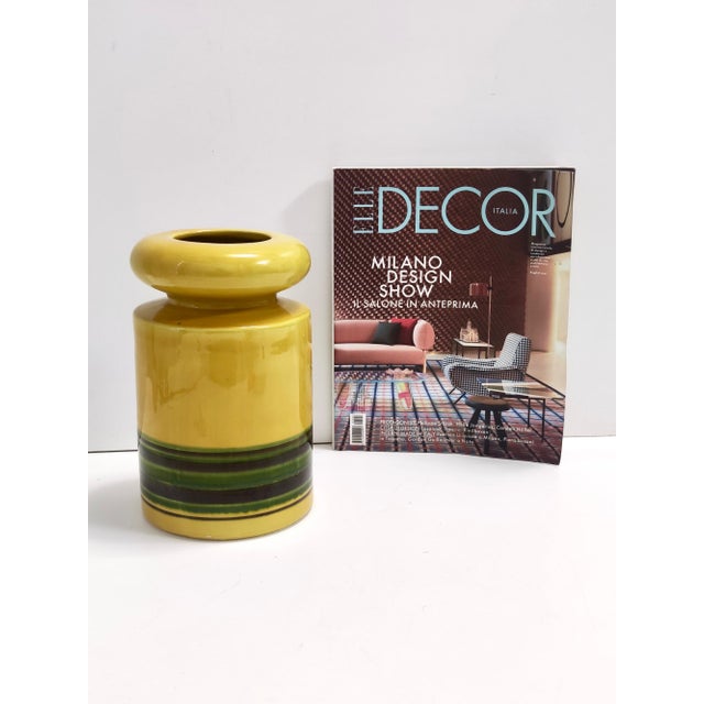 Made in Italy, 1970s. These two blue bottles and yellow vase are made in glazed ceramic by Parravicini. Parravicini is not...