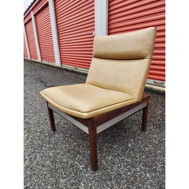 Stunning example of simple modernist lines, love the aluminum detail. Some wear present on the back of the seats and very...