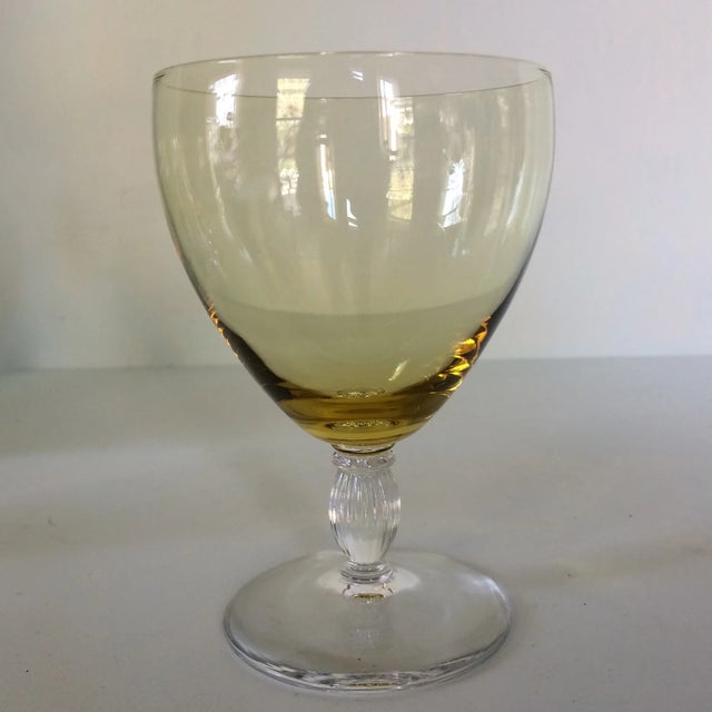 Beautiful set of 4 clear yellow crystal stemware. Glasses have a high end look with quality detail.
