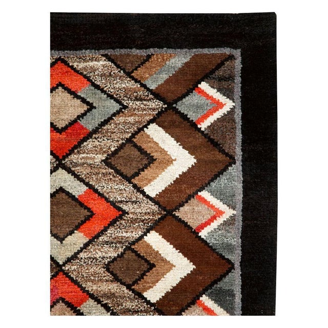 A vintage Polish geometric Art Deco style accent rug handmade during the mid-20th century. Measures: 4' 0" x 6' 6"