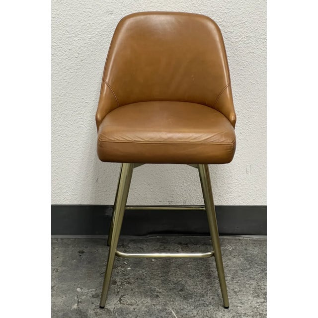Design Plus Gallery presents a Set of Three Mid Century Swivel Stools from West Elm. Presents timeless mid-century design...
