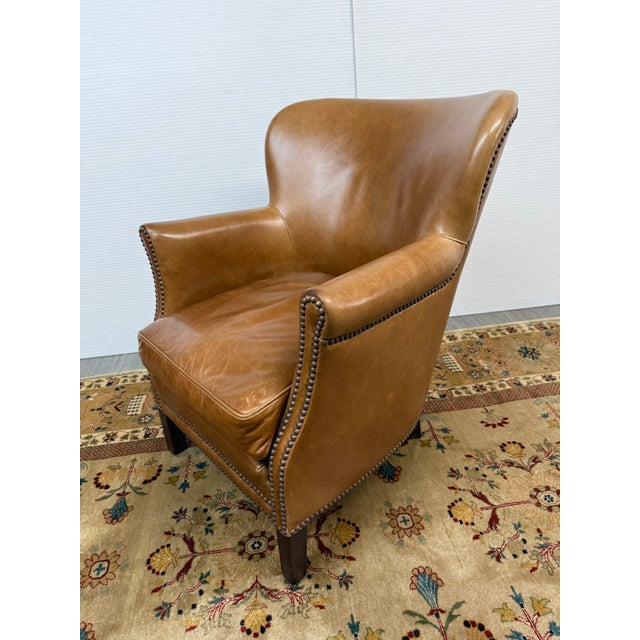 Design Plus Gallery presents a Wingback Club Chair from Sunrise Home. This lounge chair has a high wingback silhouette,...