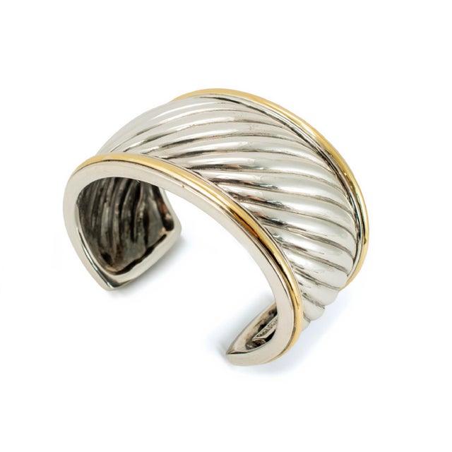 Brand: David Yurman Gender: Ladies Metal Type: 18K Yellow Gold & Silver Length: 6.00 inches Width: 1.50 inches Weight:...