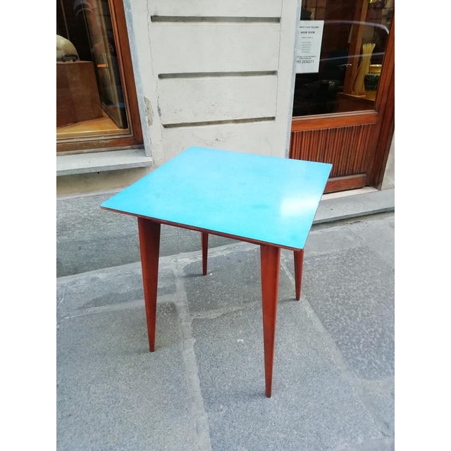 Bistrot table/Restaurant/60s bar. Contained dimensions. Wooden structure and plane in colorful blue formic. Piano size...