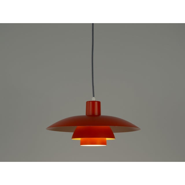 The ph 4/3 lamp is an absolute classic, designed by the renowned danish designer and architect poul henningsen. It has...