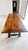 Late 19th-century Spanish trestle table with a richly grained wood top and distinctive wrought-iron base. Its hand-...