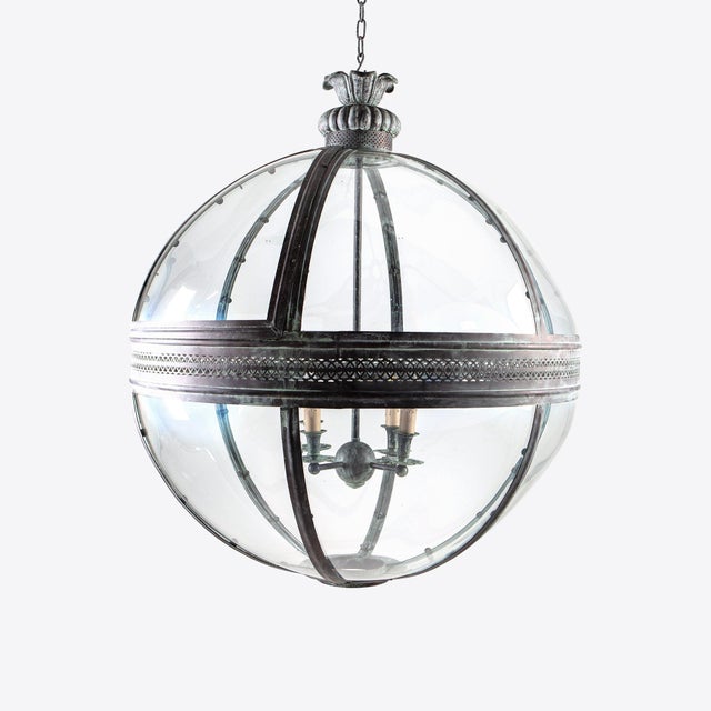 The Grande Hampstead globe lantern is made from solid brass with a beautiful verdigris finish. An oversized hanging...