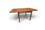 A very unusual and neat Danish teak dining table designed by Poul Hundevad for Hundevad & Co, Denmark. The table is square...