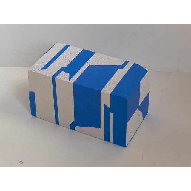 Work N° 4 by Kevin Cheng-Feng YU 1) Untitled 2) Cellular concrete, blue tape 3) Year of creation: 2020 4) 10X9,7X18,2cm 5)...
