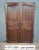 A beautiful pair of Louis XV period walnut doors featuring elegant molded decoration with scalloped panels. Each door leaf...