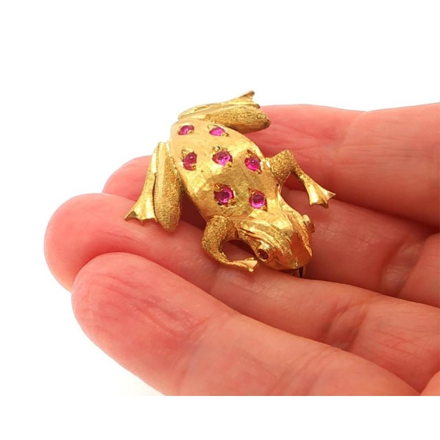 This adorable authentic Estate brooch is crafted in solid 18k yellow gold and features a charming full-figure 3D frog...
