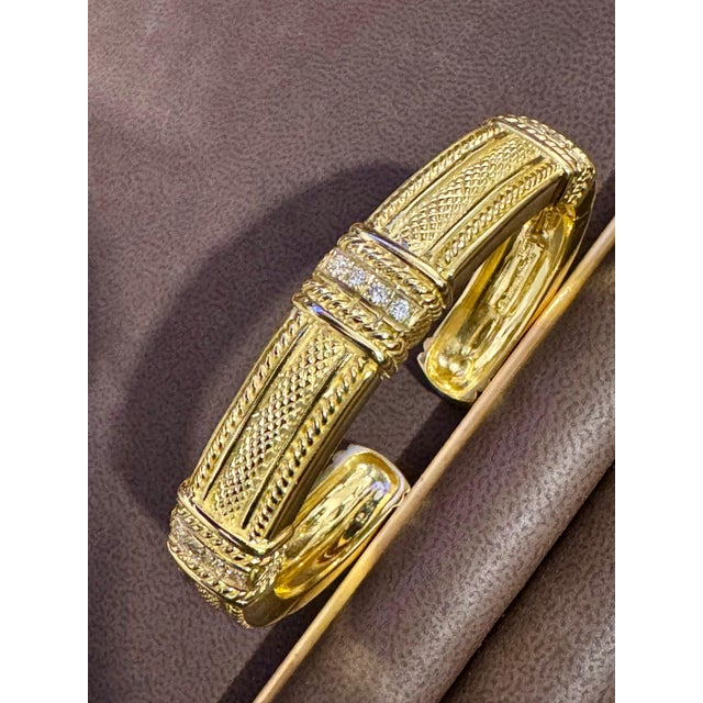 Dazzling Judith Ripka Hinged Gold and Diamond Bangle Bracelet with Diamonds This classic, vintage Judith Ripka bangle...