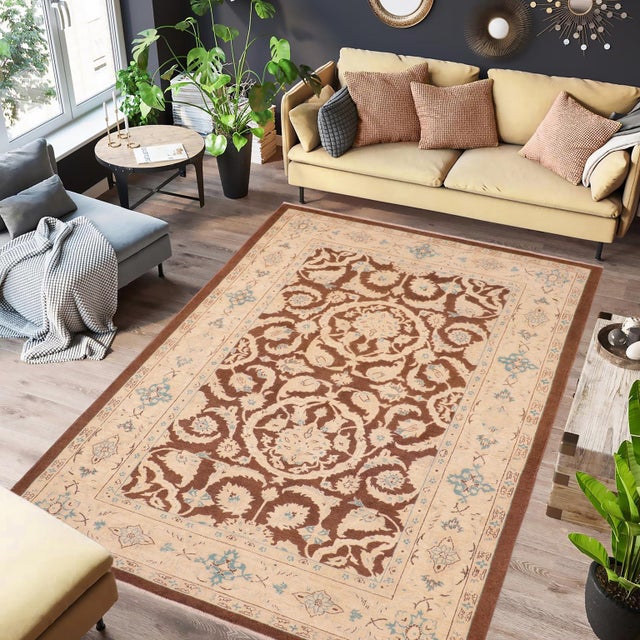 "Enhance the ambiance of your home with this magnificent Persian-influenced Turkish hand-knotted rug made by skilled...